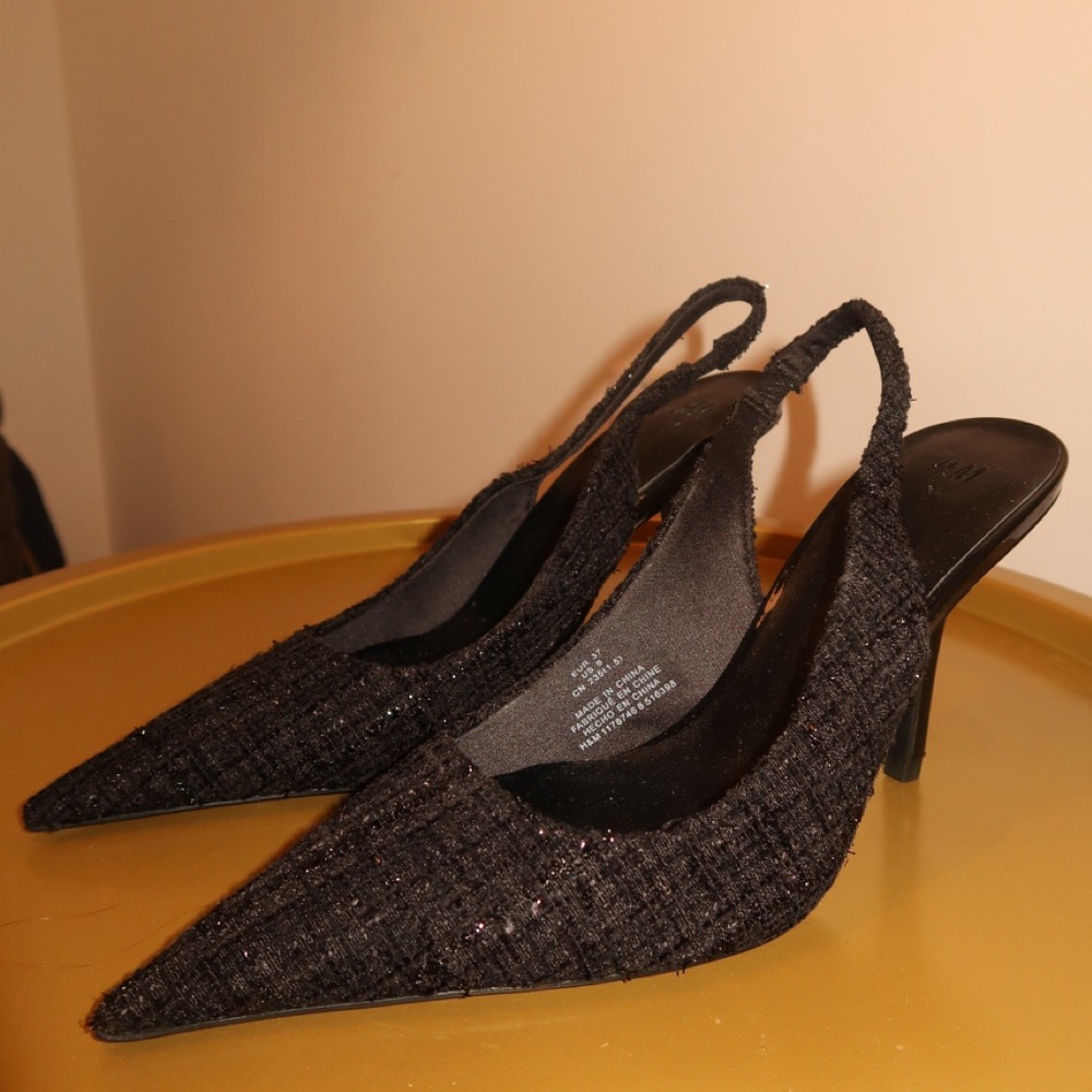 Black pointed heels size 6.5